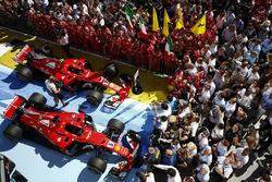 The Ferrari team celebrate by the cars of Sebastian Vettel, Ferrari SF70H, race winner, Kimi Raikkonen, Ferrari SF70H, second place, in Parc Ferme