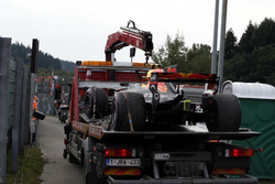 The car of Max Verstappen, Red Bull Racing RB13 is recovered by marshals after stopping on track
