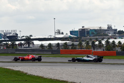 Kimi Raikkonen, Ferrari SF70H and Valtteri Bottas, Mercedes-Benz F1 W08