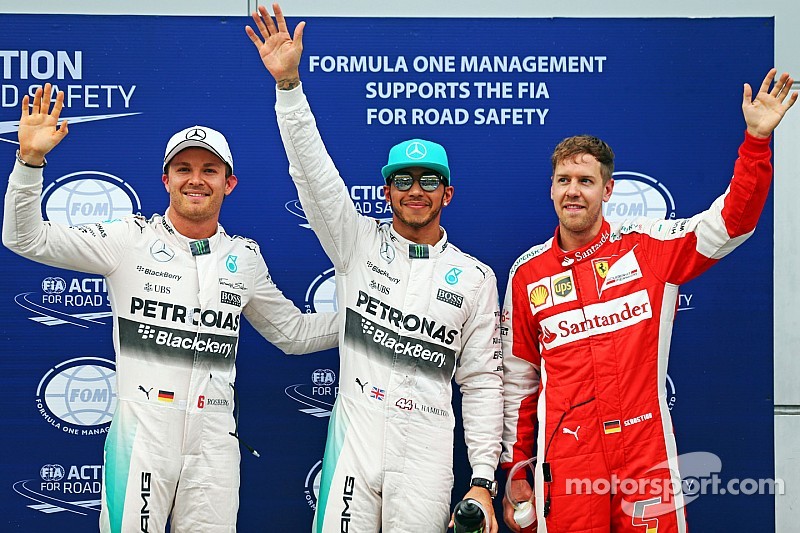 Hamilton takes Malaysian GP pole, as Vettel splits Mercedes
