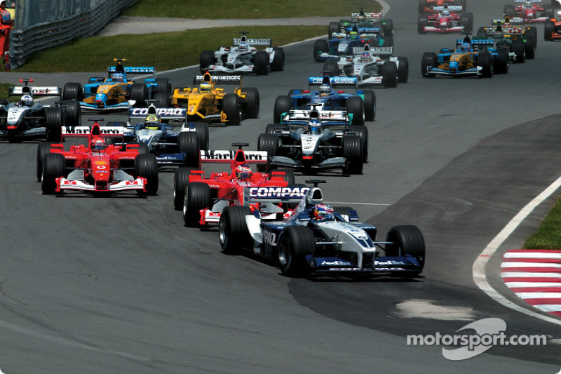 Start: Juan Pablo Montoya leading Rubens Barrichello ve Michael Schumacher