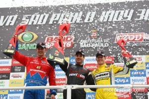 Podium: winner Will Power, Team Penske, second place Graham Rahal, Chip Ganassi Racing, third place Ryan Briscoe, Team Penske