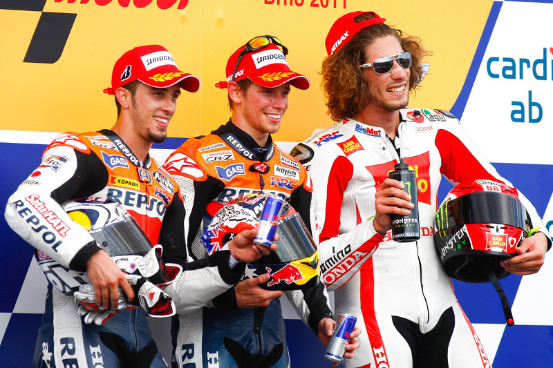 Подіум: переможець Кейсі Стоунер, Repsol Honda Team, друге місце - Андреа Довіціозо, Repsol Honda Te