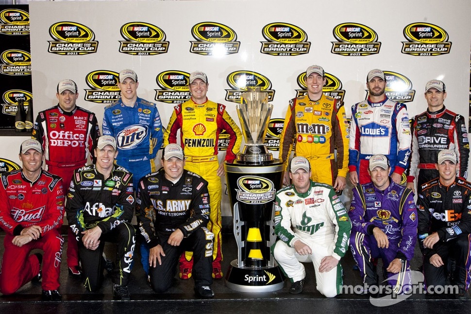 Tony Stewart, Brad Keselowski, Kurt Busch, Kyle Busch, Jimmie Johnson, Jeff Gordon, Kevin Harvick, Carl Edwards, Ryan Newman, Dale Earnhardt Jr., Matt Kenseth and Denny Hamlin pose after clinching spots in the Chase for the NASCAR Sprint Cup