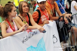 A banner of support from fans of Maria De Villota, Marussia F1 Team Test Driver in the pit lane walkabout