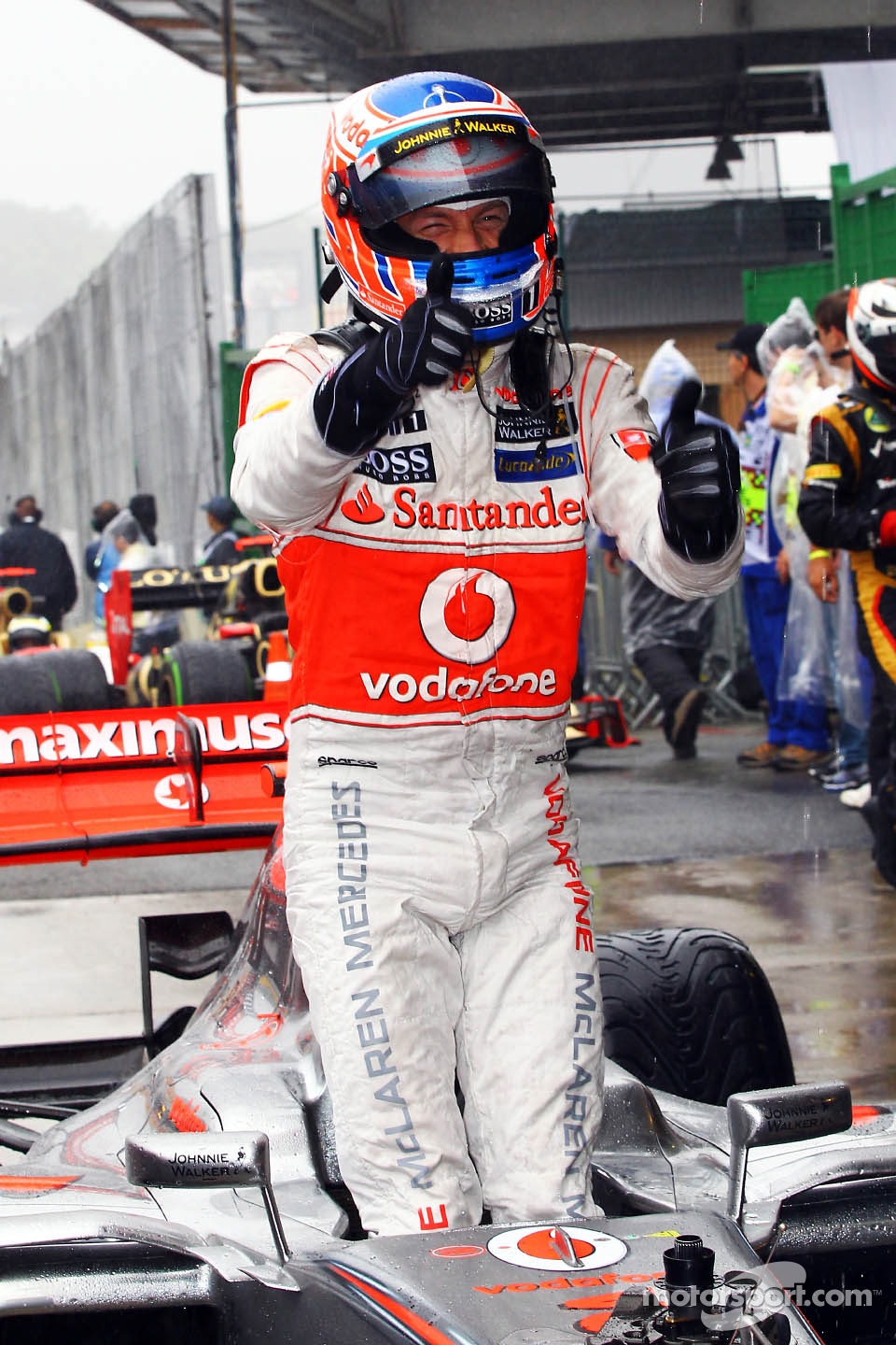 Race winner Jenson Button, McLaren celebrates in parc ferme