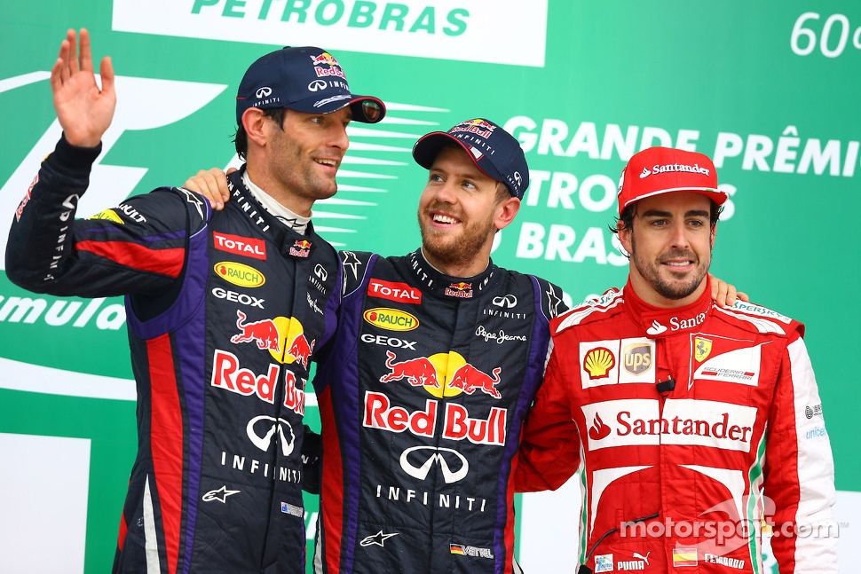 The podium: Mark Webber, Red Bull Racing, second; Sebastian Vettel, Red Bull Racing, race winner; Fernando Alonso, Ferrari, third