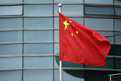 Chinesische Flagge im Fahrerlager