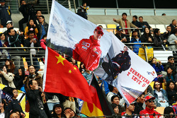 Flags for Michael Schumacher, and Sebastian Vettel, Red Bull Racing.