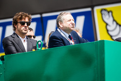 Fernando Alonso and Jean Todt watch the race from the starter stand