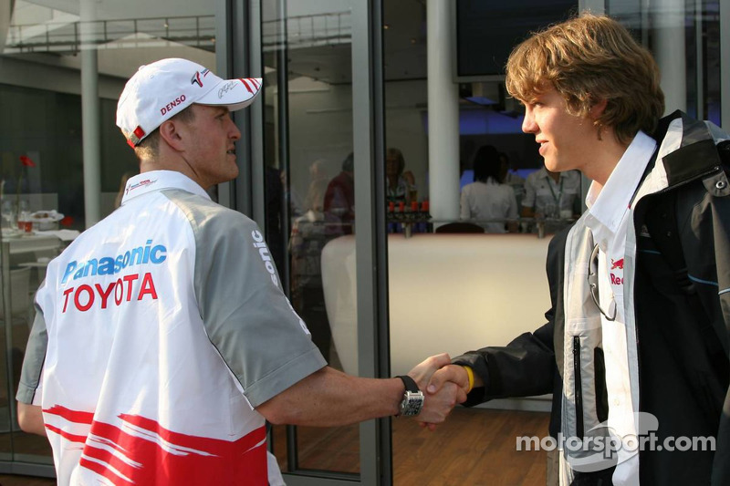 Пилот команды Toyota Ральф Шумахер и тест-пилот команды BMW Sauber Себастьян Феттель на Гран При Сан-Марино 2006 года