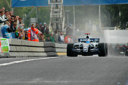 People taking pictures, Rosberg doing a burn out