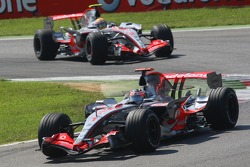 Fernando Alonso, McLaren Mercedes, MP4-22 and Lewis Hamilton, McLaren Mercedes, MP4-22