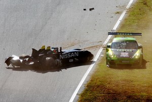 Crash between #0 Nissan DeltaWing Project 56 Nissan: Lucas Ordonez, Gunnar Jeannette and #34 Green Hornet Racing Porsche 911 GT3 Cup: Peter LeSaffre, Damien Faulkner, Brian Wong