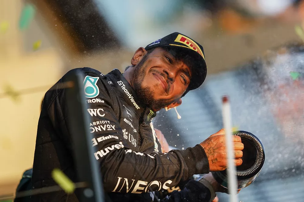 Lewis Hamilton, Mercedes-AMG, 2nd position, sprays Champagne on the podium