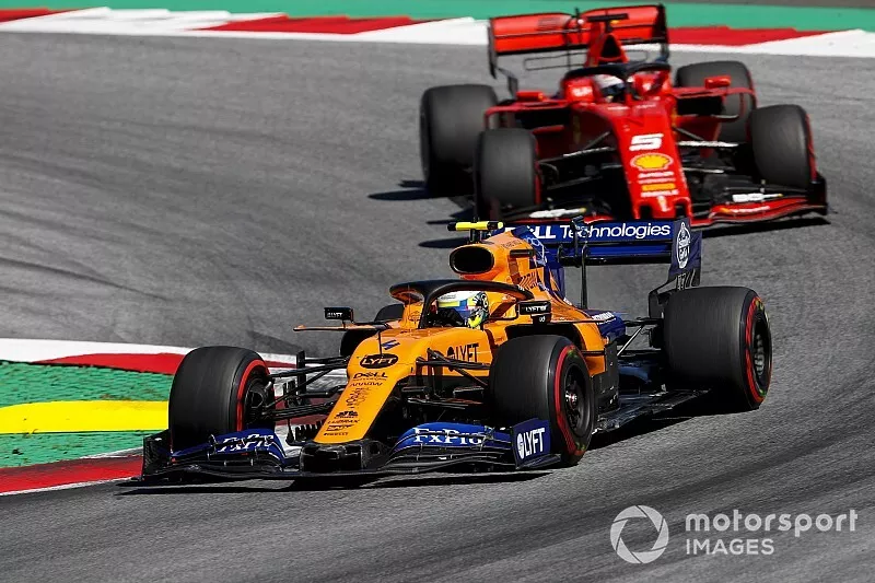 Lando Norris, McLaren MCL34, devant Sebastian Vettel, Ferrari SF90