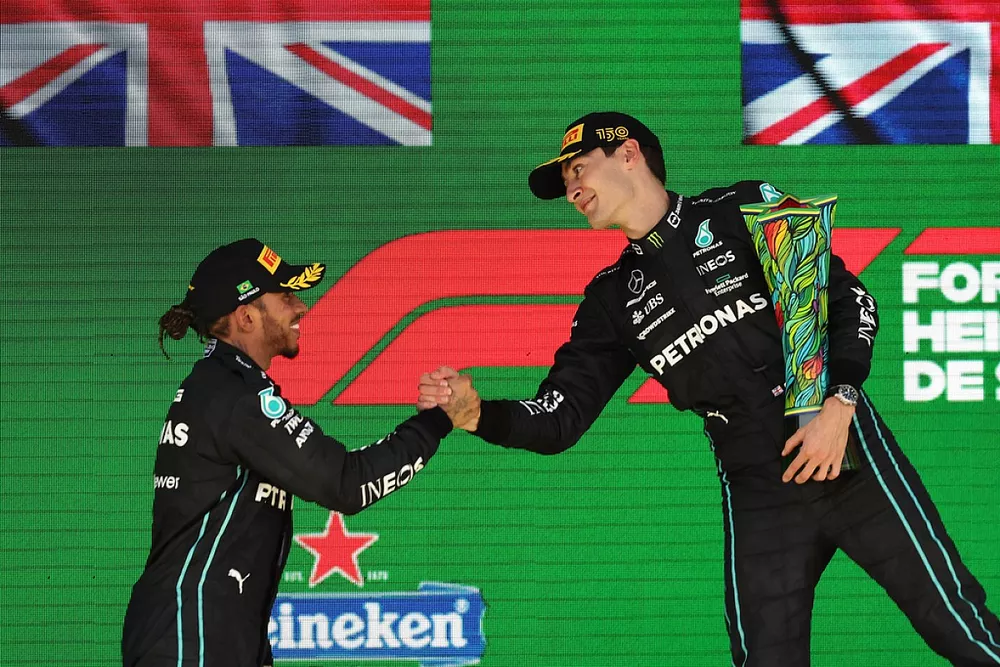 Lewis Hamilton, Mercedes AMG, 2nd position, George Russell, Mercedes AMG, 1st position, congratulate each other on the podium