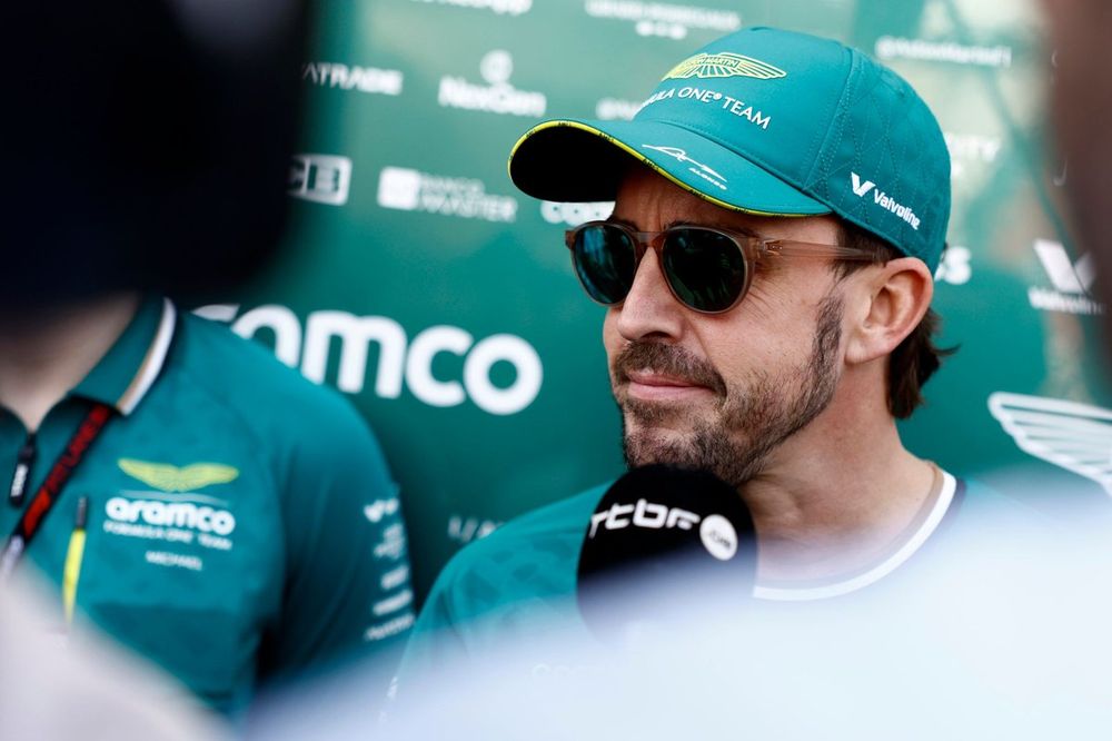 Fernando Alonso, Aston Martin F1 Team, talks to the media