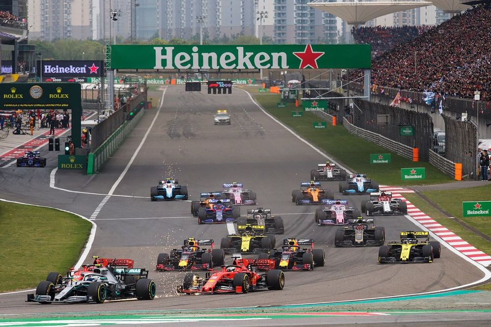 Valtteri Bottas, Mercedes AMG W10, leads Charles Leclerc, Ferrari SF90, Sebastian Vettel, Ferrari SF90, Max Verstappen, Red Bull Racing RB15, Pierre Gasly, Red Bull Racing RB15, Daniel Ricciardo, Renault F1 Team R.S.19, Nico Hulkenberg, Renault F1 Team R.S. 19, and the remainder of the field at the start