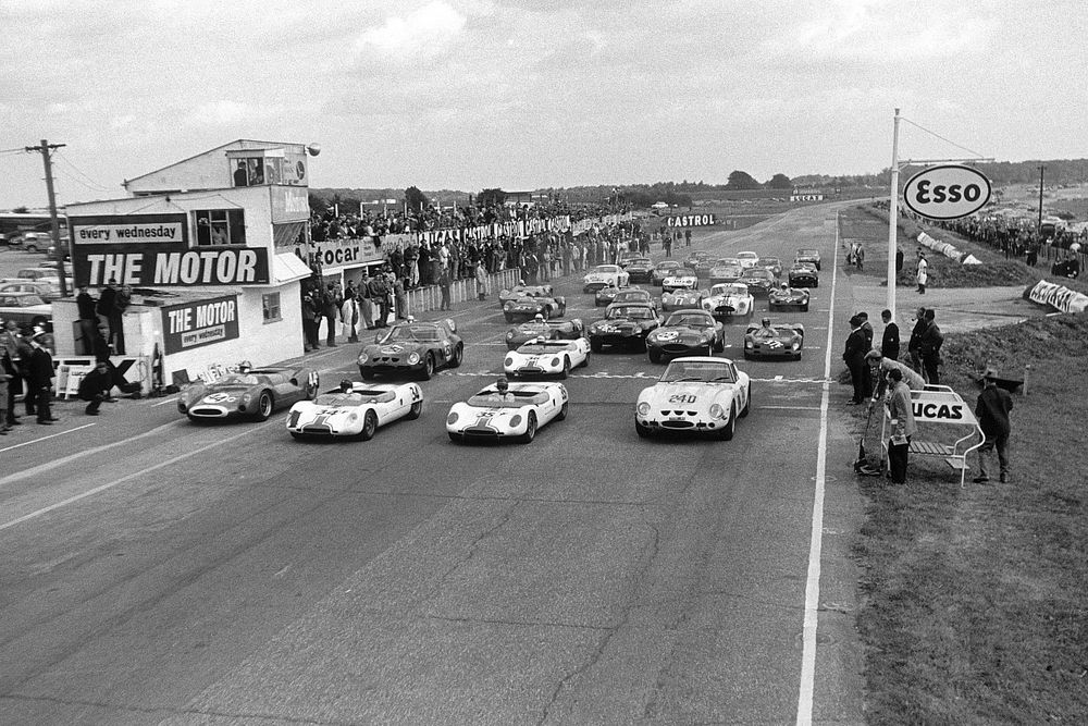 Roy Salvadori, Cooper Monaco T61 Climax Jim Clark Lotus 23B Ford, Tony Hegbourne, Loyus 23B Ford, and Jack Sears, Ferrari 250 GTO, at the start of the race,