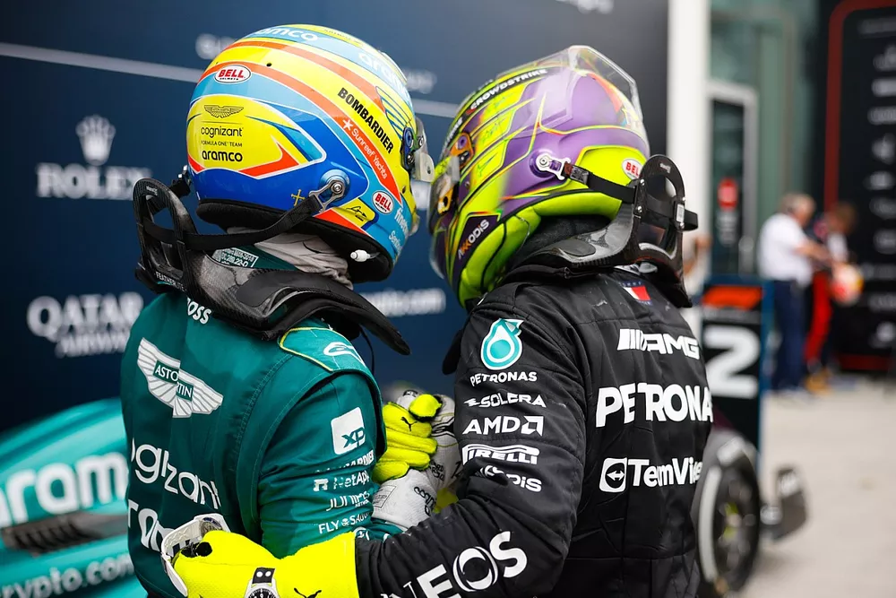 Fernando Alonso, Aston Martin F1 Team, 2nd position, Lewis Hamilton, Mercedes-AMG, 3rd position, congratulate each other in Parc Ferme