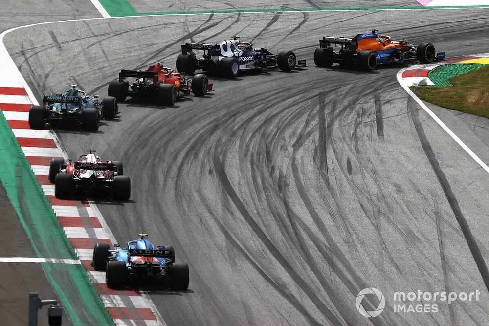Daniel Ricciardo, McLaren MCL35M, Yuki Tsunoda, AlphaTauri AT02, Carlos Sainz Jr., Ferrari SF21, and Sebastian Vettel, Aston Martin AMR21