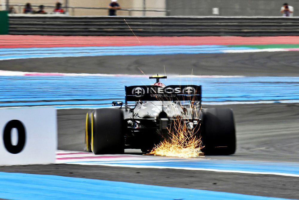 Sparks fly from Valtteri Bottas, Mercedes W12