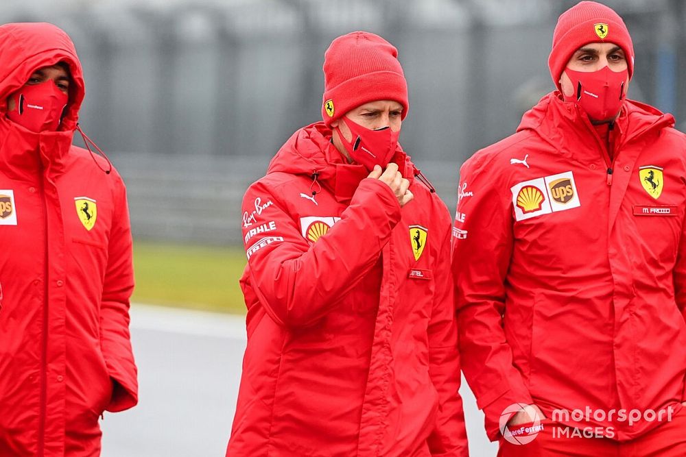 Sebastian Vettel, Ferrari walks the track with members of his Ferrari team