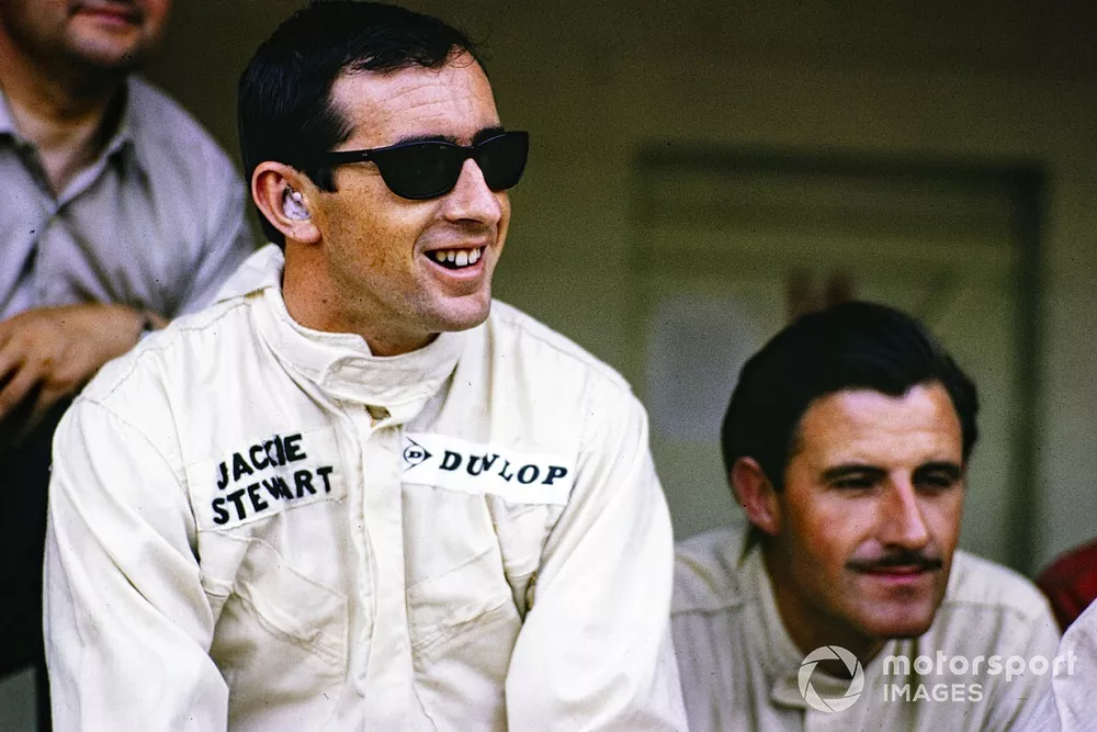 Jackie Stewart and Graham Hill in the pitlane, BRM