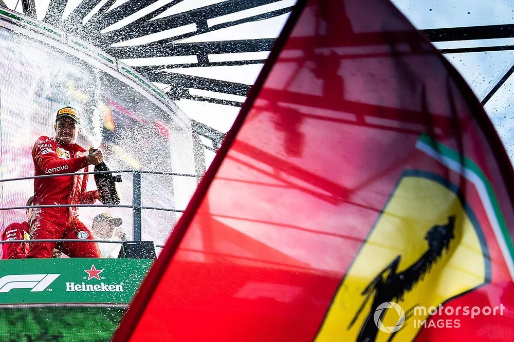 Race winner Charles Leclerc, Ferrari celebrates on the podium with the champagne 
