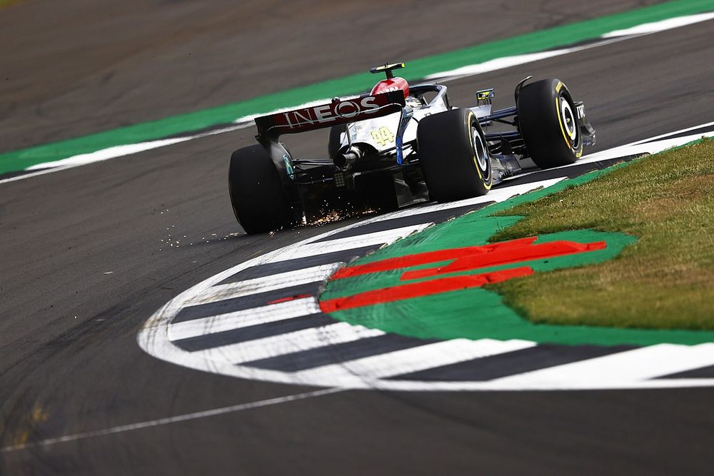 Sparks trail behind Lewis Hamilton, Mercedes W13