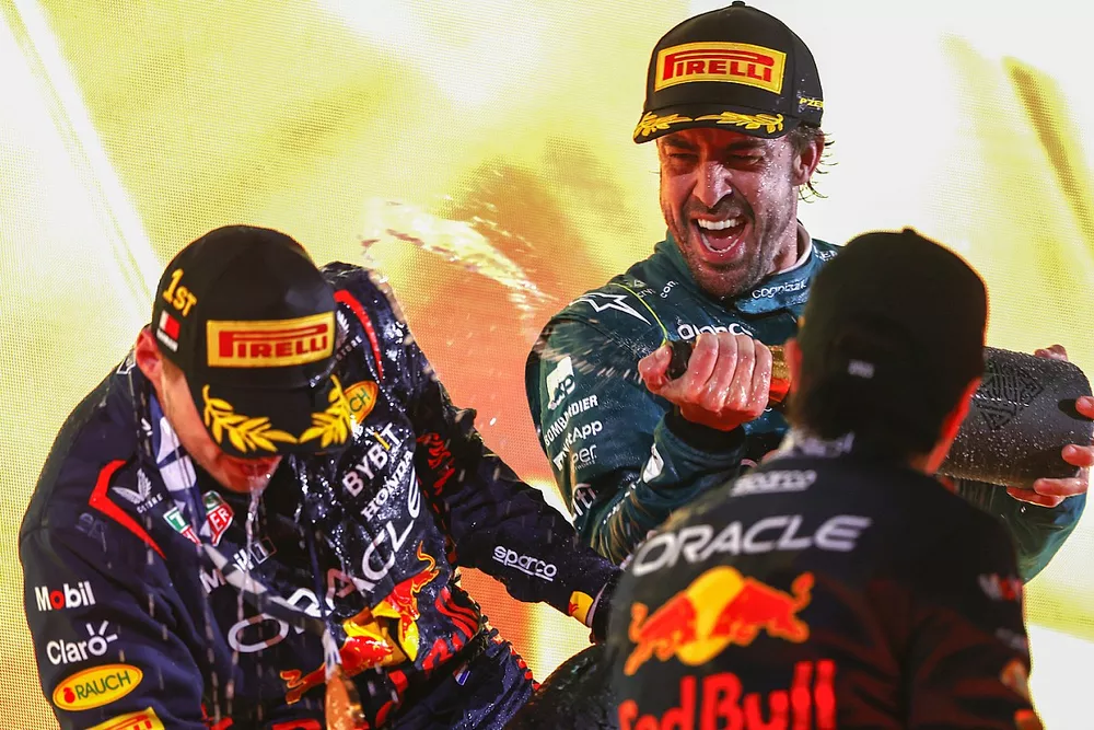 Max Verstappen, Red Bull Racing, 1st position, Fernando Alonso, Aston Martin F1 Team, 3rd position, Sergio Perez, Red Bull Racing, 2nd position, celebrate on the podium