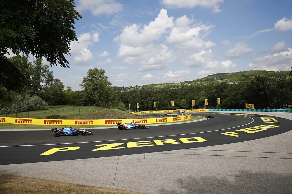 Esteban Ocon, Alpine A521, George Russell, Williams FW43B