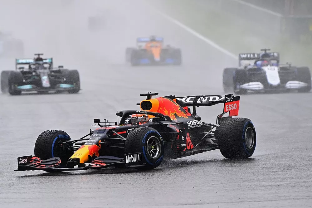 Max Verstappen, Red Bull Racing RB16B, George Russell, Williams FW43B, and Sir Lewis Hamilton, Mercedes W12