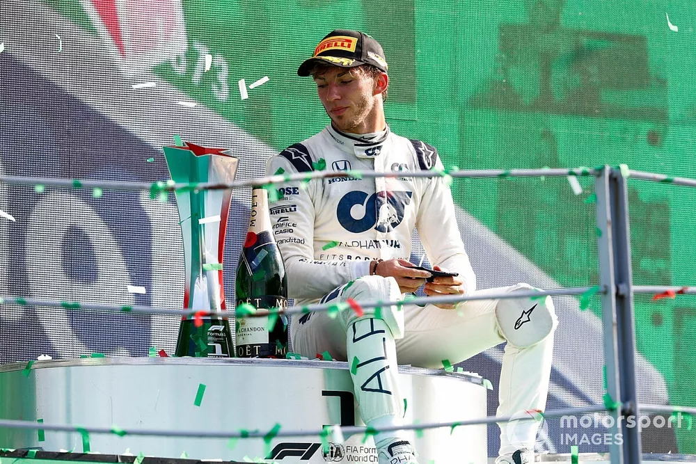Pierre Gasly, AlphaTauri, 1st position, on the podium with his trophy