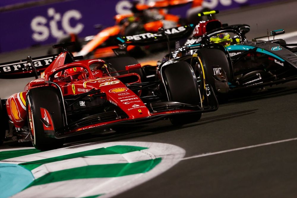 Charles Leclerc, Ferrari SF-24, battles with Lewis Hamilton, Mercedes F1 W15