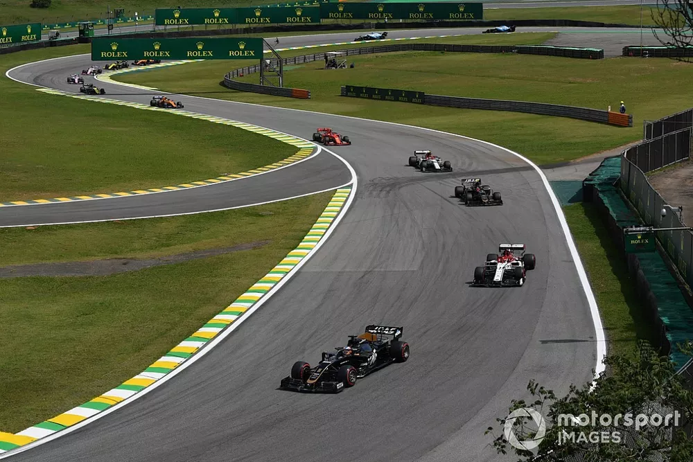 Romain Grosjean, Haas F1 Team VF-19, leads Kimi Raikkonen, Alfa Romeo Racing C38, Kevin Magnussen, Haas F1 Team VF-19, and Antonio Giovinazzi, Alfa Romeo Racing C38