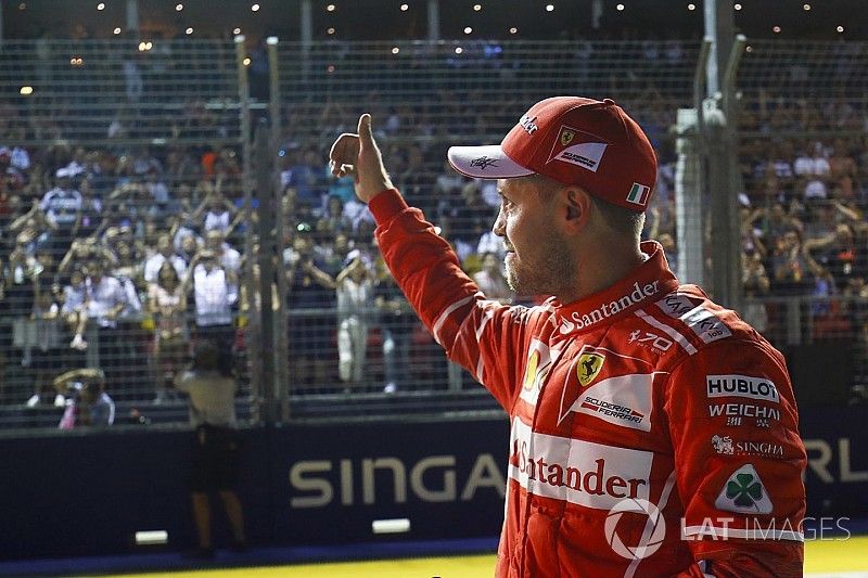 Ganador de la pole Sebastian Vettel, Ferrari