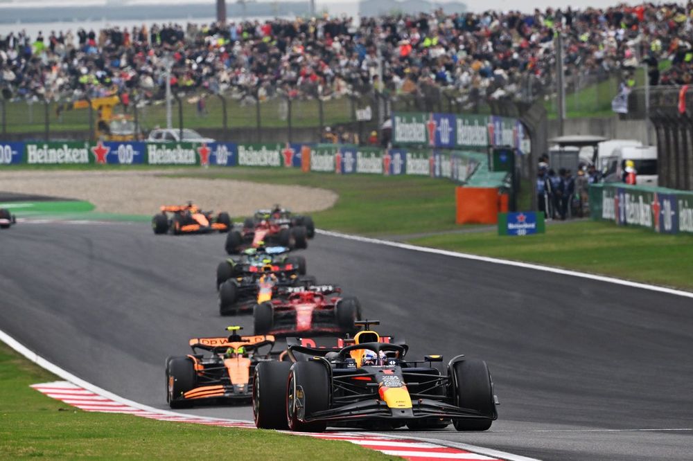 Max Verstappen, Red Bull Racing RB20, leads Lando Norris, McLaren MCL38, Charles Leclerc, Ferrari SF-24