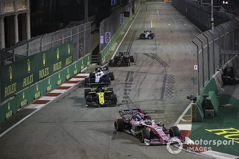 Sergio Perez, Racing Point RP19, leads Daniel Ricciardo, Renault F1 Team R.S.19, Robert Kubica, Williams FW42, and Romain Grosjean, Haas F1 Team VF-19