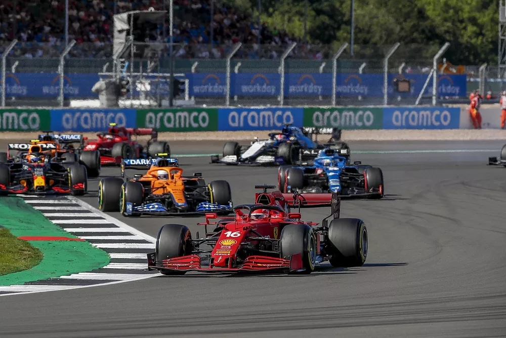 Charles Leclerc, Ferrari SF21, Lando Norris, McLaren MCL35M, and Sergio Perez, Red Bull Racing RB16B
