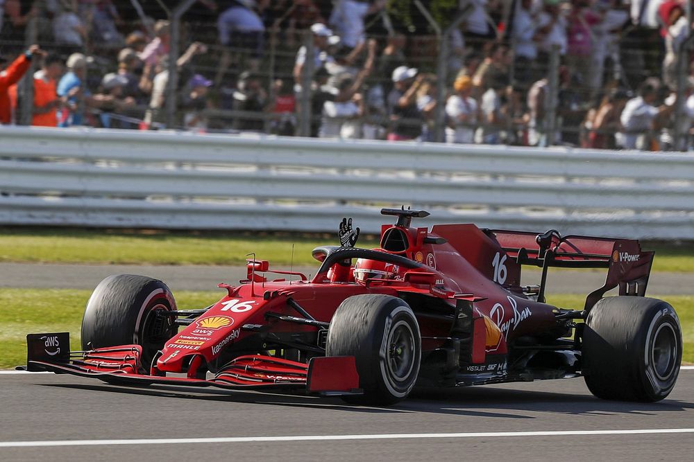 Charles Leclerc, Ferrari SF21, 2nd position, waves from his cockpit on his way to Parc Ferme