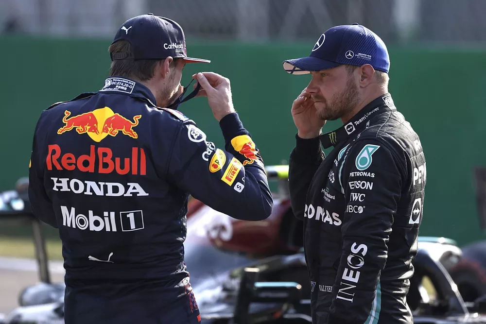 Max Verstappen, Red Bull Racing, 2nd position, and Valtteri Bottas, Mercedes, 1st position, talk after Sprint Qualifying