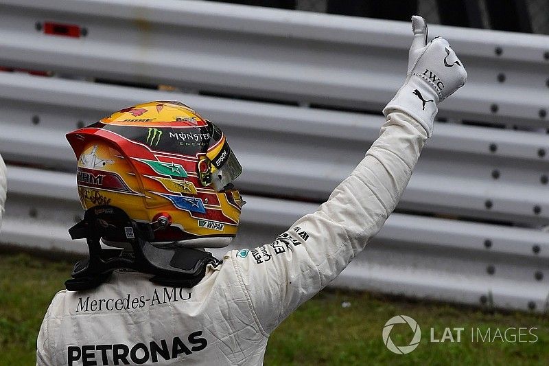 Pole sitter Lewis Hamilton, Mercedes AMG F1 celebrates in parc ferme