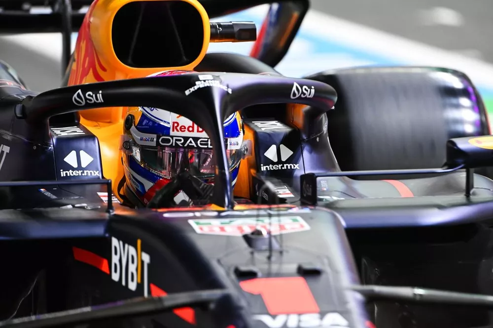 Max Verstappen, Red Bull Racing RB20 in the pit lane