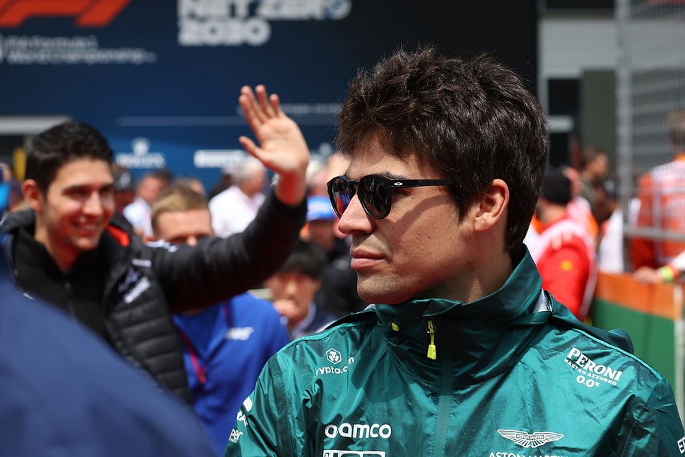 Lance Stroll, Aston Martin, walking to the drivers parade bus