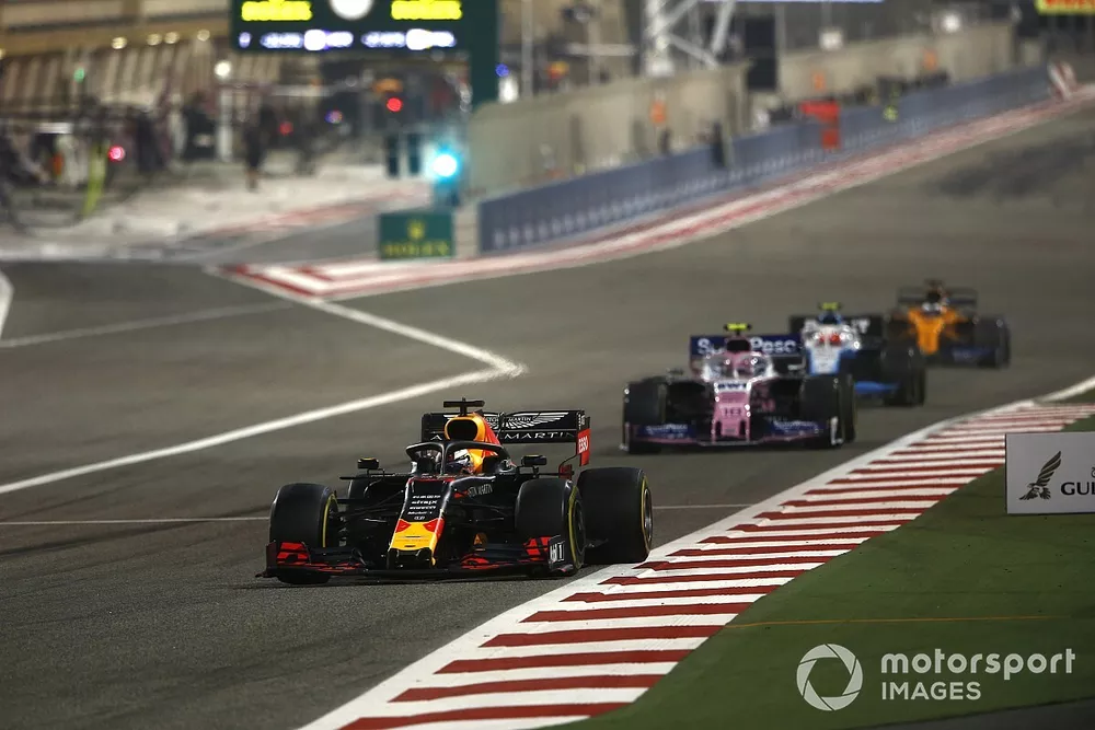 Max Verstappen, Red Bull Racing RB15, leads Lance Stroll, Racing Point RP19, and Robert Kubica, Williams FW42