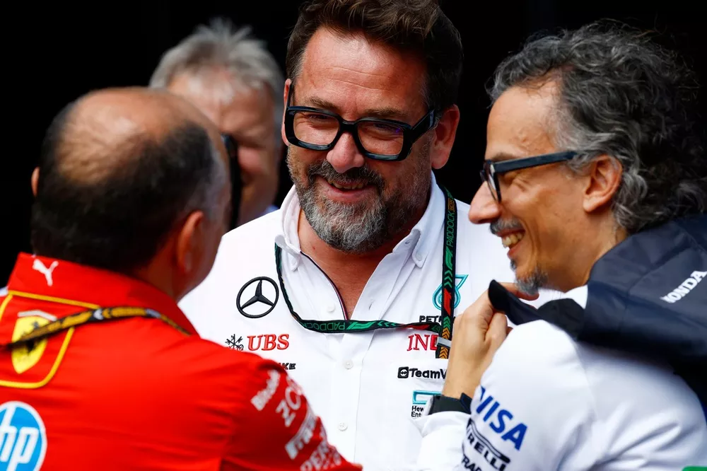 Frederic Vasseur, Team Principal and General Manager, Scuderia Ferrari, in conversation with Gwen Lagrue, Mercedes Driver Development Advisor, Laurent Mekies, Team Principal, RB F1 Team 