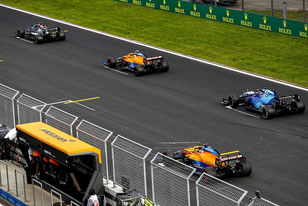 Lewis Hamilton, Mercedes W12, Lando Norris, McLaren MCL35M, George Russell, Williams FW43B, and Daniel Ricciardo, McLaren MCL35M, practice their start procedures at the end of FP2