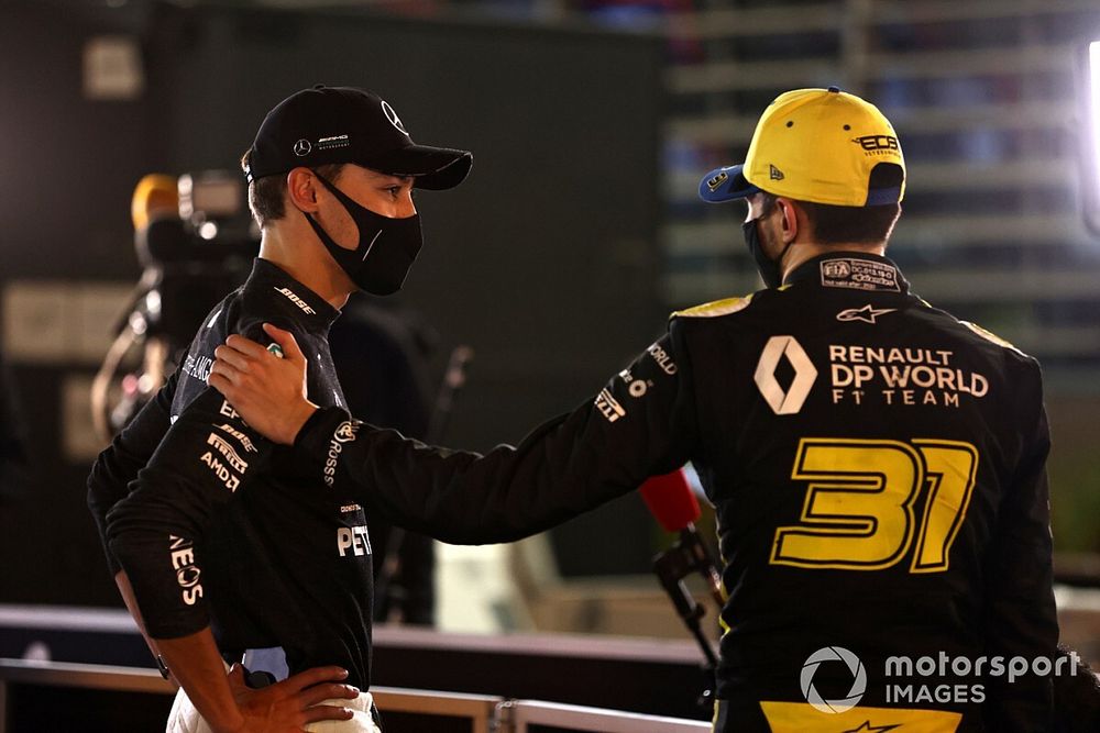 George Russell, Mercedes-AMG F1, with Esteban Ocon, Renault F1